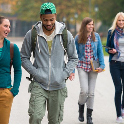 Students walking through a campus